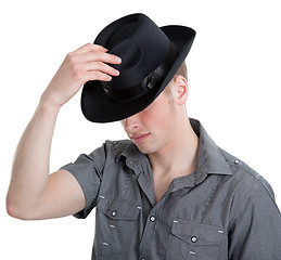 Image showing the guy in the black hat