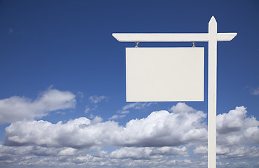 Image showing Blank White Real Estate Sign Over Sky and Clouds