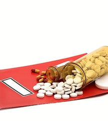 Image showing medical folder & pills