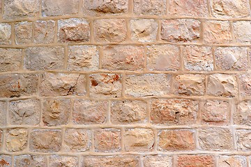 Image showing Wall built of rough stone blocks 