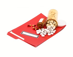 Image showing medical folder & pills