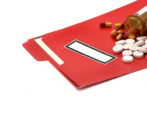 Image showing medical folder & pills