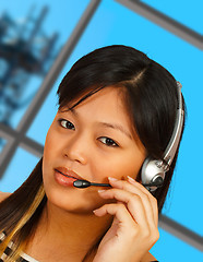 Image showing Telephone Operator With Communications Tower Background