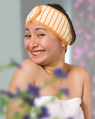 Image showing Smiling Woman In Her Bedroom Getting Dressed