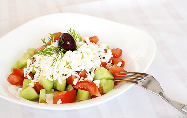 Image showing Eating fresh salad