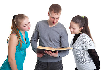 Image showing Three young men are preparing for the exam at school