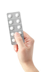 Image showing pills in a hand