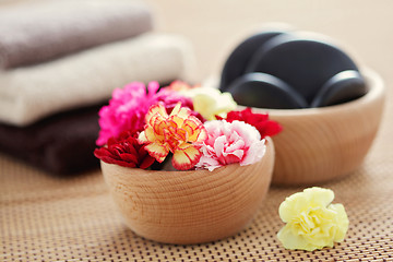 Image showing carnations and pebbles