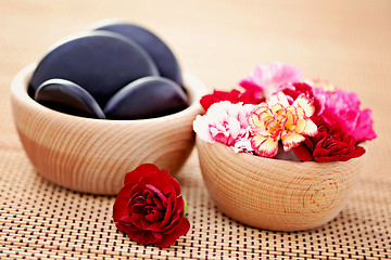 Image showing carnations and pebbles