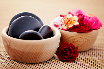 Image showing carnations and pebbles