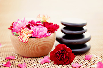 Image showing carnations and pebbles