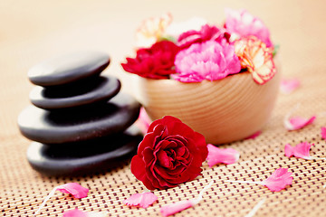 Image showing carnations and pebbles