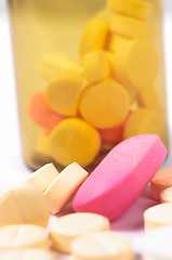 Image showing A bottle of medicines with white isolated background