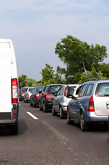 Image showing Traffic jam with trees in the background