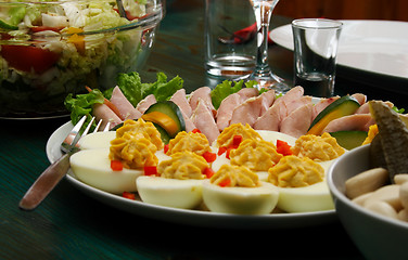 Image showing eggs and pork on table