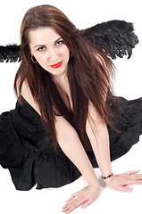 Image showing Beautiful brunette woman with black wings