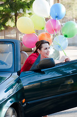 Image showing Beautiful brunette woman in car