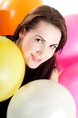 Image showing Beautiful woman with multicolored air balloons