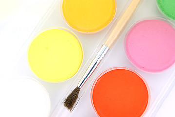 Image showing New watercolors and a brush