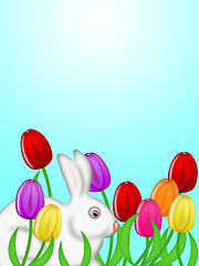 Image showing White Easter Bunny Amongst Colorful Tulips