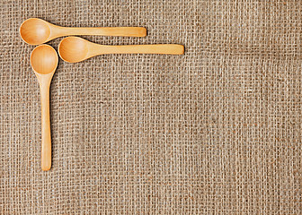 Image showing Linen background with spoon