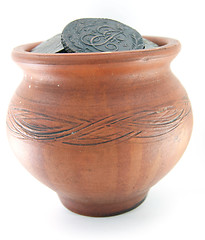 Image showing Clay pot with ancient coins