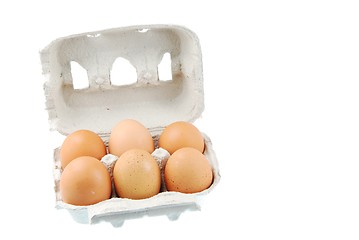 Image showing Six brown eggs packed in a carton box