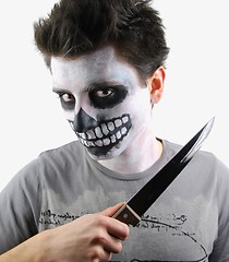 Image showing Murderer skeleton guy with a bloody knife