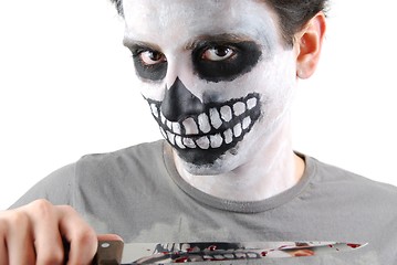 Image showing Murderer skeleton guy with a bloody knife