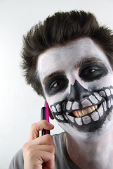 Image showing Skeleton guy talking on mobile phone