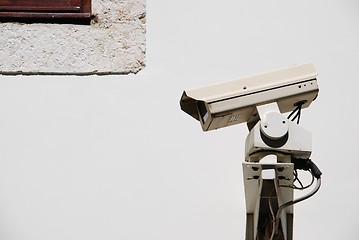 Image showing Security camera by the window