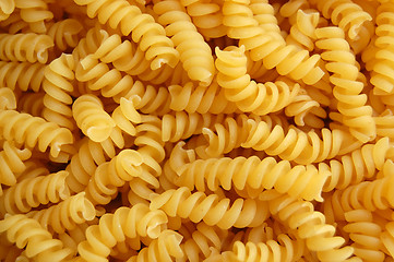 Image showing Eliche twirls pasta background