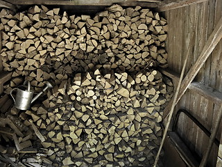 Image showing Stacked chopped firewood