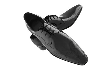 Image showing The black man shoes