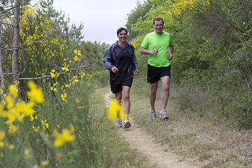 Image showing Couple running