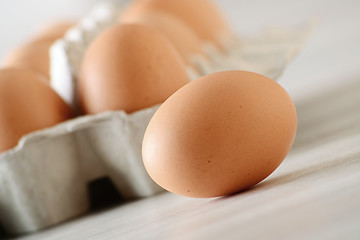 Image showing Chicken eggs on kitchen table