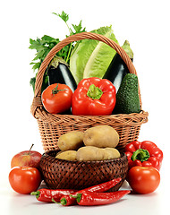 Image showing Composition with raw vegetables and wicker basket