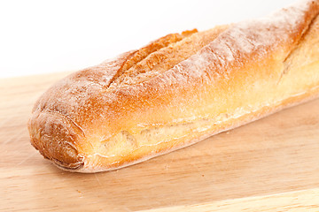 Image showing baguette on the wooden board 