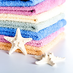 Image showing towels and sea stars