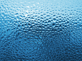 Image showing natural water drops on glass