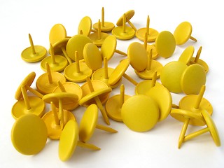 Image showing Yellow thumbtacks