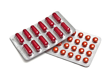 Image showing Red pills and capsules