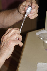 Image showing preparing the injection