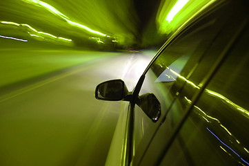 Image showing night drive with car in motion 