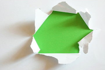 Image showing green hole in blank sheet paper