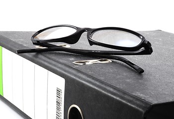 Image showing eye glasses and folder