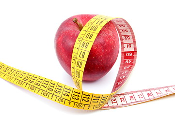 Image showing Apple and measuring tape on white