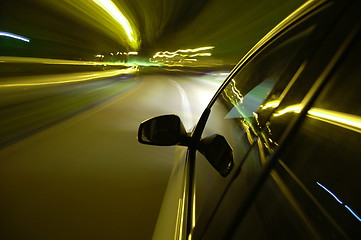 Image showing night drive with car in motion 