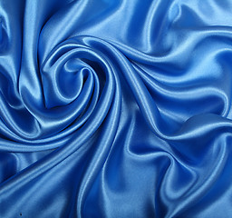 Image showing Smooth elegant dark blue silk as background 