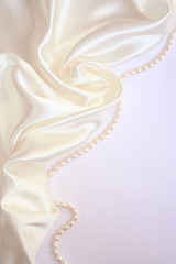 Image showing Smooth elegant white silk with pearls as wedding background 